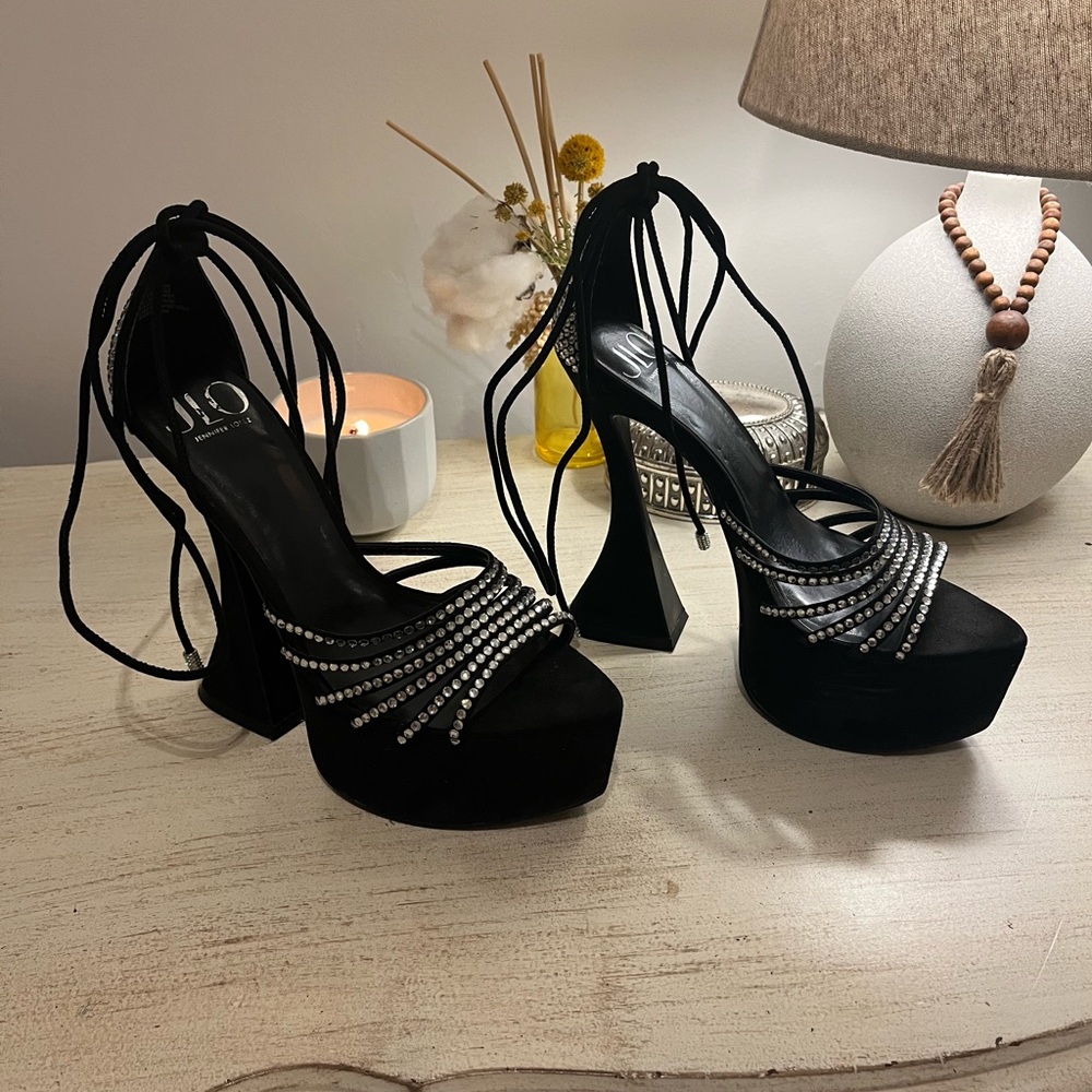 Jennifer Lopez Black Heels with Silver Straps